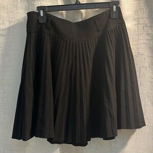 Papaya Pleated Skirt above the knee